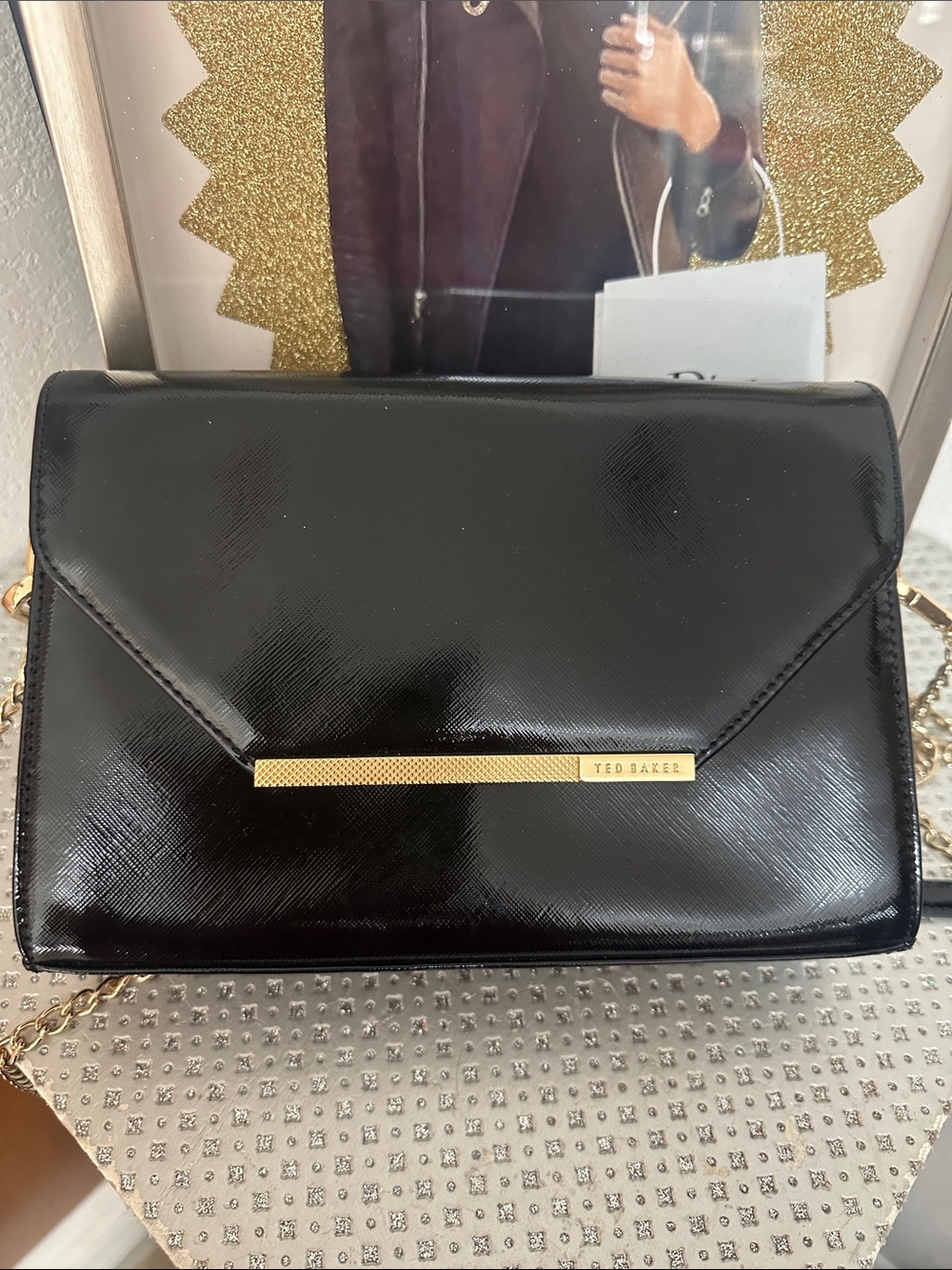 Ted Baker Black Patent Envelope Crossbody with Gold Bar Accent